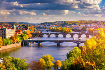 Autumn view to Charles bridge on Vltava river in Prague, Czech Republic. Autumn view to Charles...