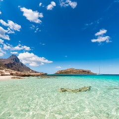 Fototapeta premium Transparent water in the Balos lagoon on the Gramvousa peninsula on the northwest coast of the Greek island of Crete