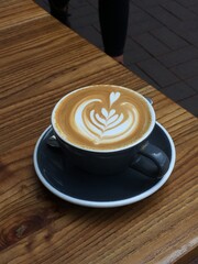 A glass of flat white
