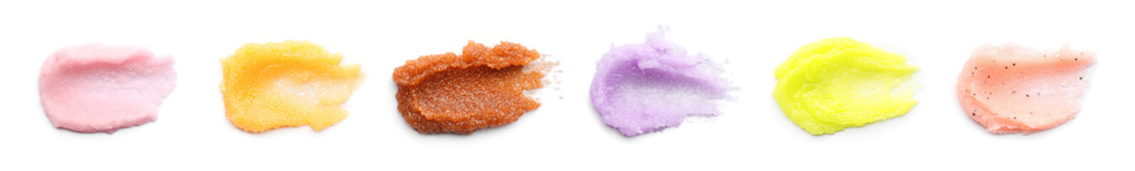 Set with smears of different body scrubs on white background. Banner design