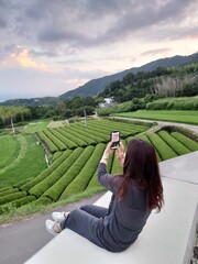 person relaxing in a garden