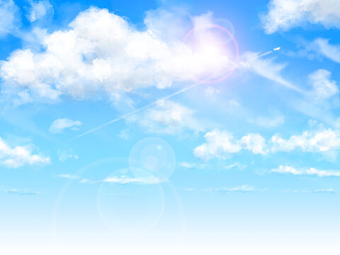 夏の青空と雲と飛行機雲