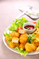 fried chicken nugget with ketchup
