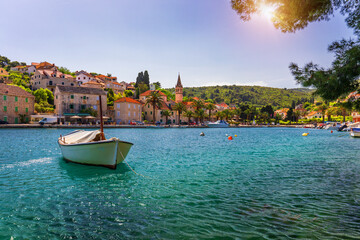 Fishing boats in Splitska village with beautiful port, Brac island, Croatia. Village of Splitska on Brac island seafront view, Dalmatia, Croatia, Croatia.