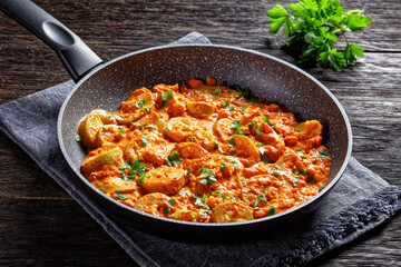 zucchini in a creamy tomato sauce, top view