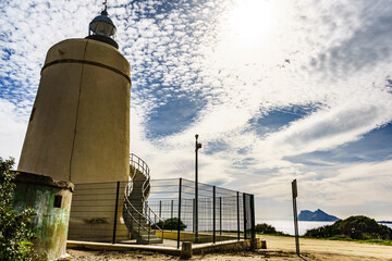 Obraz premium Lighthouse and Gibraltar rock, La Alcaidesa, Spain.