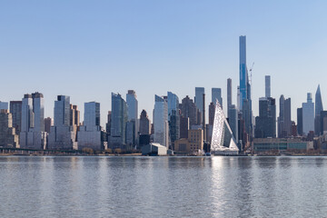 Naklejka premium Beautiful Modern Midtown Manhattan Skyline with Tall Skyscrapers in New York City along the Hudson River