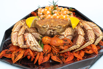 close-up Creative edible Food bouquet  on white background. Handmade bouquet for a man of crab, shrimp, crayfish, lemon. Business idea