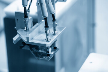 The hi-technology  material handling circuit board parts production line by robotic system. The automatic pneumatic robotic arm picking the computer parts in production line.