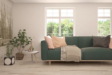 White living room with sofa and summer landscape in window. Scandinavian interior design. 3D illustration