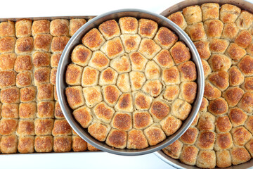 Traditional Bosnian pastry- manti borek with ground meat (kiymali) isolated on white background....