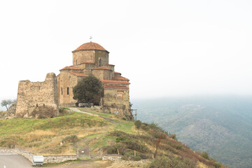 Fototapeta na wymiar Jvari Monastery With Remains Of Stone Wall (Mtskheta City) 