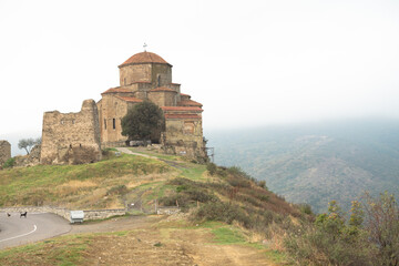 Fototapeta na wymiar Jvari Monastery With Remains Of Stone Wall (Mtskheta City) 