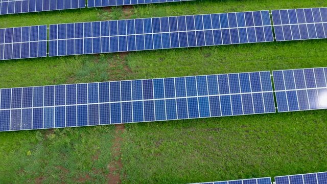 Close-up of photovoltaic devices on private land. Increased production of semiconductor material. Mastering solar energy technologies. High quality. 4k footage.