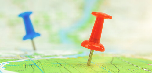 Banner travel map with push pins, tourism and trip concept background, selective focus