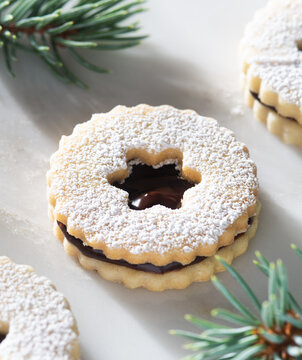Chocolate Linzer Cookies With Evergreen Christmas Decorations