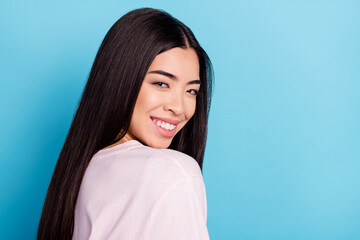 Profile portrait of gorgeous satisfied person toothy smile look camera isolated on pastel blue color background