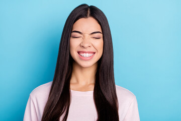 Fototapeta premium Photo of young cheerful chinese girl happy positive toothy smile laugh isolated over blue color background