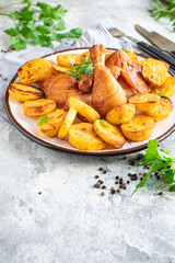 chicken and potatoes fried baked vegetable poultry meat dish on the table healthy meal snack copy space food background rustic 