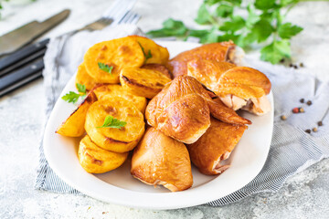 chicken and potatoes fried baked vegetable poultry meat dish on the table healthy meal snack copy space food background rustic 