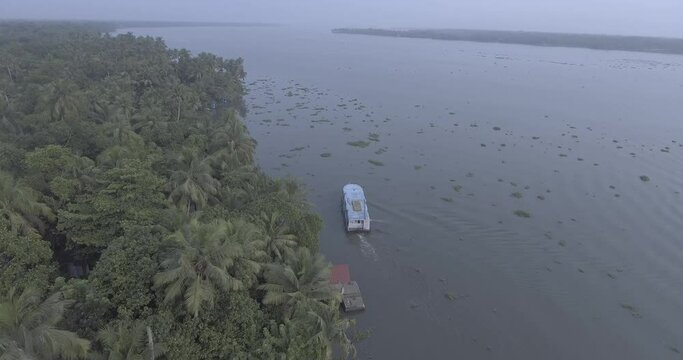 kerala location alappuzha boat moving in water log fotage 