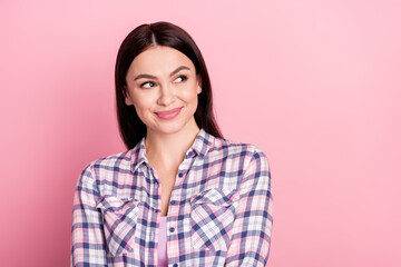 Fototapeta premium Photo of charming dreamy young woman look empty space smile imagine isolated on pink color background