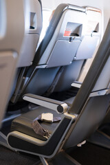 Interior of an empty airplane. Empty aircraft seats with seat belts
