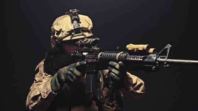 An American Marine reloads his rifle. Tactical reload.