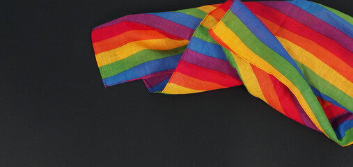 Rainbow handkerchief isolated on black background.