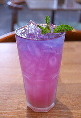 Iced Butterfly Pea Flower Tea Changed from Blue to Purple Color after Added Fresh Lime Juice