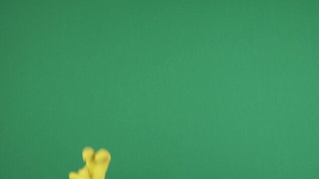 Hands counting from 1 to 5. Hands with protective rubber gloves show one, two, three, four, five fingers and sign ok over chroma key green screen background. 4k video