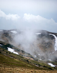 Mountain range in the Ukrainian carpathians on a spring day. Rest and travel in the mountains.