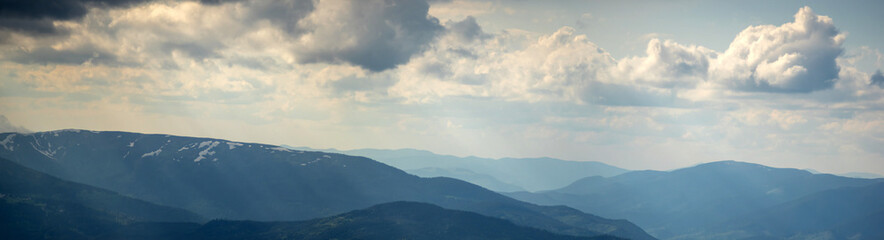 Mountain range in the Ukrainian carpathians on a spring day. Rest and travel in the mountains.