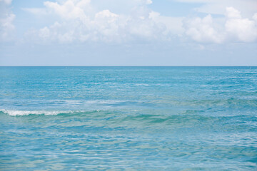 Fototapeta na wymiar Beach / Ocean beautiful turquoise water with ripples 