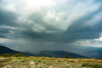 Rain and thunderstorm in the Carpathian mountains in Ukraine