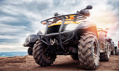 ATV quad bike on forest offroad, front view. Concept motocross quadricycle summer travel background - obrazy, fototapety, plakaty