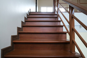beauty wooden stair in new house . oak color iron Handrail decor interior estate. abstract going up...