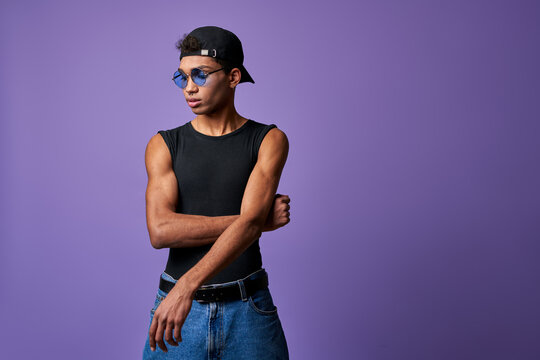 Portrait transgender young man in casual dress. Latin american trans gender model in black t-shirt