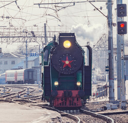 Retro train departs from the platform. Aleksandrov.