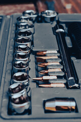 Vertical image of a rattle toolset in a box