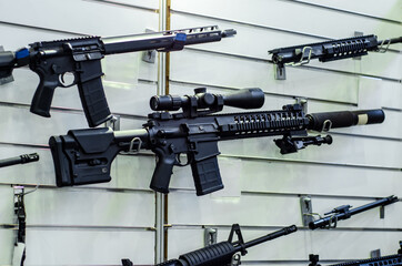 Gun wall rack with rifles