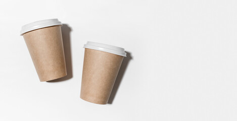 Disposable paper coffee cup isolated on white background. Mockup. Zero waste minimalistic concept. Copy space