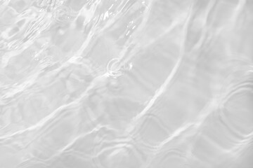 Obraz premium Water texture overlay effect photo or mockup. Organic drop shadow caustic effect with wave refraction of light on a white pool wall.