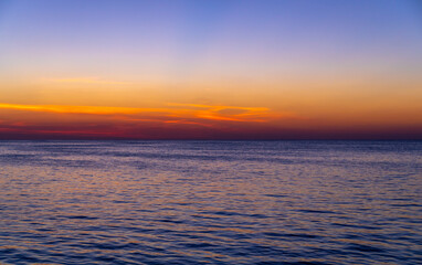Fototapeta na wymiar Sunset Over The Sea