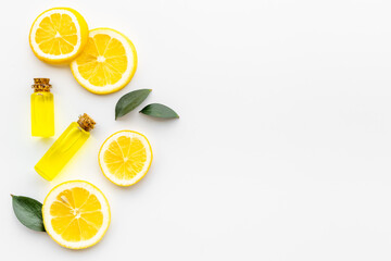 Citrus essential oil vitamin c and lemon slices top view