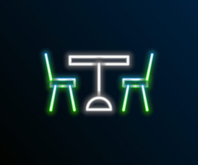 Glowing neon line Picnic table with chairs on either side of the table icon isolated on black background. Colorful outline concept. Vector