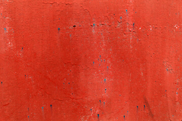 Red paint on vintage wall