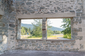 window opening in a stone wall of a structure