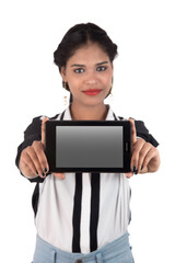 Fototapeta premium Young beautiful woman holding blank screen smart phone on white background