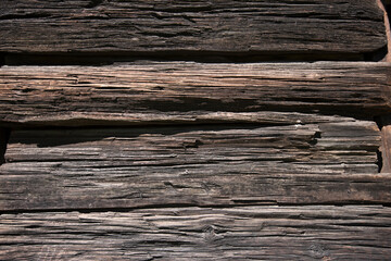 Logs of an old log house wall in Stockholm
